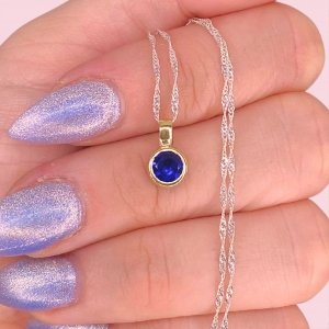 Cadena Singapur Fino Brilloso y Dije Susanita 8mm Zafiro de Plata enchapado en Oro